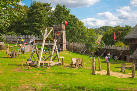 Essex, UK - 31 August, 2018: Catapult. Norman village reconstruction, educational centre for kids with historical activities as knight fighting, catapult operation and every day life experience.のeditorial素材