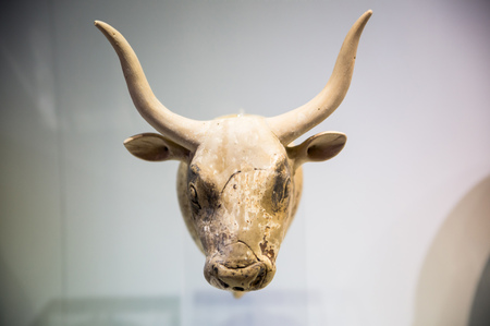 Greece, Crete, Heraklion - July 18, 2018: Sacred Bull. Minoan art from the Knossos Palace.  Archaeological museum displayのeditorial素材