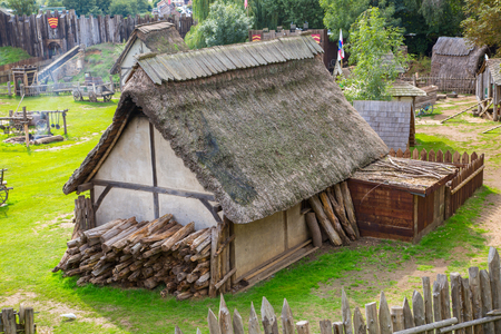 Essex, UK - 31 August, 2018: Norman village reconstruction, dated back to 1050. Educational centre for kids with demonstration of everyday life and skills medieval timeのeditorial素材