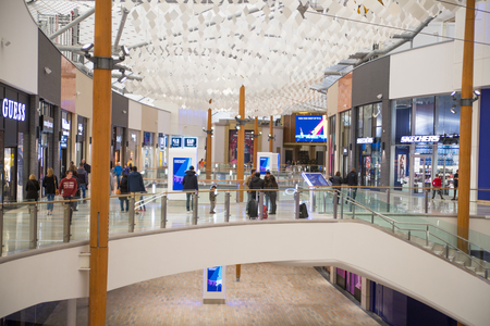 London, UK - 24 March, 2019: Shopping centre in North Greenwich. New modern residential aria with wide range  entertainment infrastructureのeditorial素材
