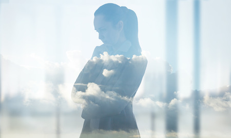 Young woman against of the window. London, UKの写真素材