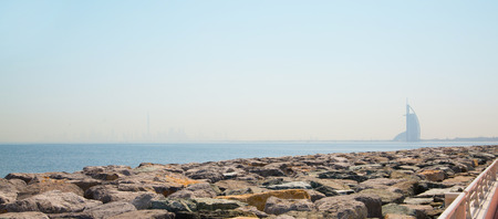 Dubai, UAE. Al Arab only the one seven stars hotel in the world, distant view from the Palm Jumeirah in early morningのeditorial素材