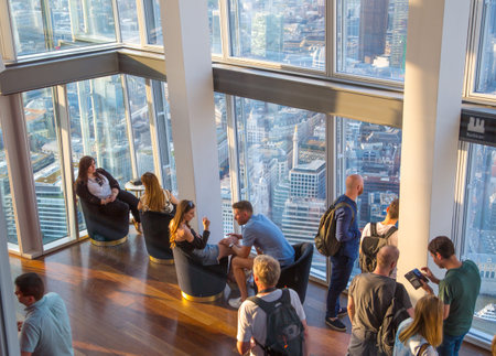London, UK - July 23, 2019: People looking over the London from the 67 floor of London's skyscraper....