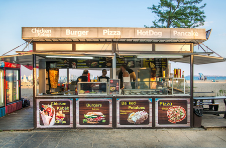 Bulgaria, Sunny Beach - 18 July, 2019: Coffee shop. Small business of Bulgaria. Little shop on Sunny Beach promenade.のeditorial素材