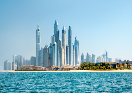 Dubai, UAE United Arabs Emirates - 29 May, 2019: Panoramic view of Dubai skyscrapers at the coast. Skyscrapers and Persian gulf.のeditorial素材