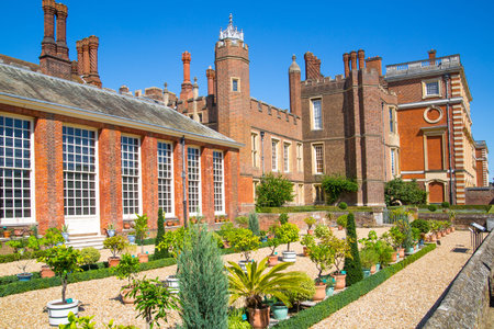London, UK - July 29, 2019: English garden view and the East Front of Hampton court 17th century locates West Londonのeditorial素材