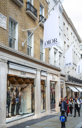 London, UK - August 13, 2019: Facade of Dior boutique shop at Old Bond street. Bond Street is a major shopping street in the West End of London for luxury designer brandsのeditorial素材