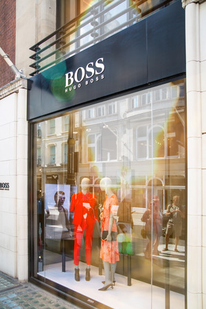 London, UK - August 13, 2019: Saint Laurent logo and designer shop at Old Bond street in Mayfair. Old Bond street is the best destination for designers luxury brands and jewelleryのeditorial素材