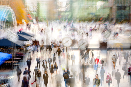 London, UK - April 26, 2019: Multiple exposure image of square in East London. Lots of people, office workers walking from tube to work. Busy life concept, business and travel.のeditorial素材