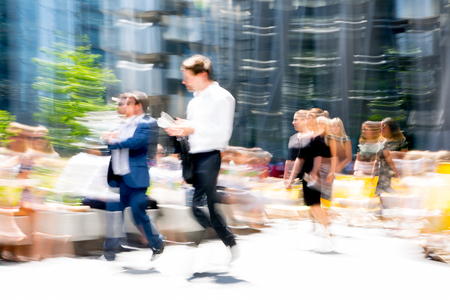 London, UK - April 19, 2018: Motion blur of business people walking in the City of London.のeditorial素材