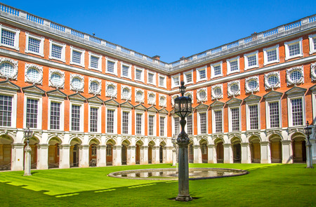 London, UK - July 29, 2019: English garden view and the East Front of Hampton court 17th century locates West Londonのeditorial素材