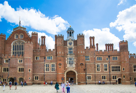 London, UK - July 29, 2019: English architecture Tudors time, West Front of Hampton court with entrance gate, locates in West Londonのeditorial素材