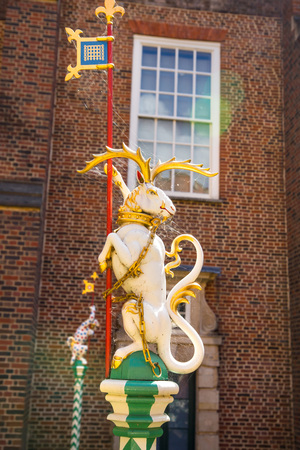 London, UK - July 29, 2019: Coat of arms, Dragons sculptures, representing power and authority. Inner yard of the Hampton court, locates in West London.のeditorial素材