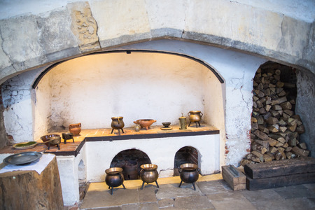 London, UK - July 29, 2019: Fire place  Tudors kitchen in the Hampton court, belonged to Henry VIII. Locates in West London.のeditorial素材