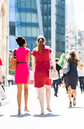 Business people walking in the City of London. Blurred image of the road with people at sunny day. London, UKのeditorial素材