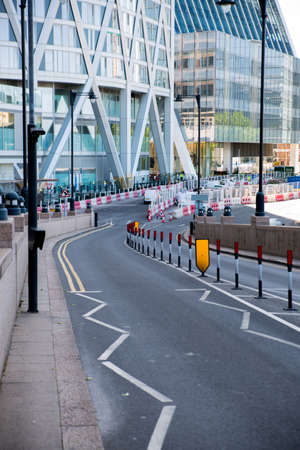 London, UK - 29 May, 2020: Canary Wharf City of London empty roads due as the result of COVID-19 coronavirus pandemic outbreak. No people, no transport, public places are closed.のeditorial素材