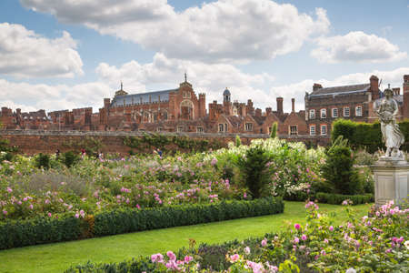 London, UK - July 29, 2019: English garden view and the East Front of Hampton court 17th century locates West Londonのeditorial素材