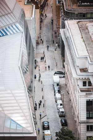 London, UK - June 20, 2019: City of London otter, view from top. Business people walking by the office blocks.のeditorial素材