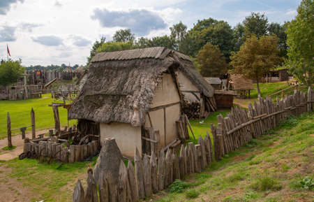 Essex, UK - 31 August, 2019: Houses in the Norman village reconstruction, educational centre for kids which represents historical activities and every day medieval life experienceのeditorial素材