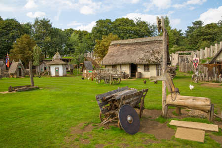 Essex, UK - 31 August, 2019: Houses in the Norman village reconstruction, educational centre for kids which represents historical activities and every day medieval life experienceのeditorial素材