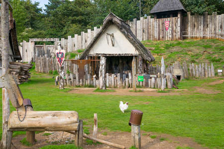 Essex, UK - 31 August, 2019: Houses in the Norman village reconstruction, educational centre for kids which represents historical activities and every day medieval life experienceのeditorial素材