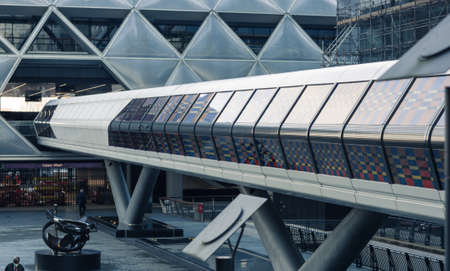 London, UK - February 2, 2021: Cross rail tunnel connecting Canary Wharf office buildings and tube entranceのeditorial素材