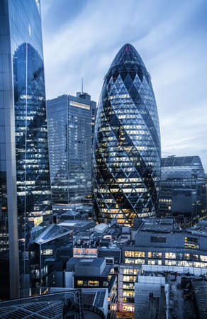 London, UK - April 25, 2021: City of London at dusk, banking and office international financial district panoramic view with skyscrapers.のeditorial素材