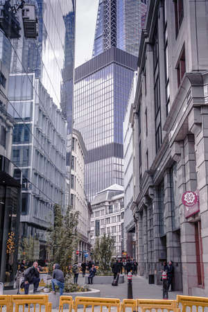 London, UK - April 25, 2019: London Wall Street, Moorgate banking and office are in the City of London. People on the roadのeditorial素材