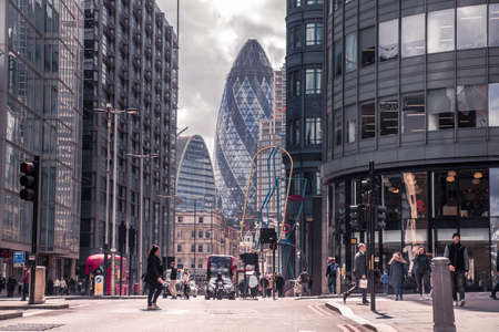 London, UK - April 25, 2019: Bishopsgate st. is one of the main streets in the City of London, business and banking are with distant view at skyscrapers and lots of walking peopleのeditorial素材