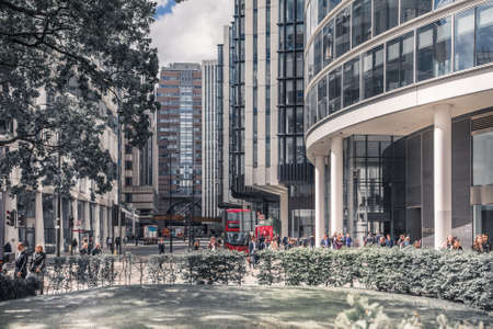 London, UK - April 25, 2019: Bishopsgate st. is one of the main streets in the City of London, business and banking are with distant view at skyscrapers and lots of walking peopleのeditorial素材
