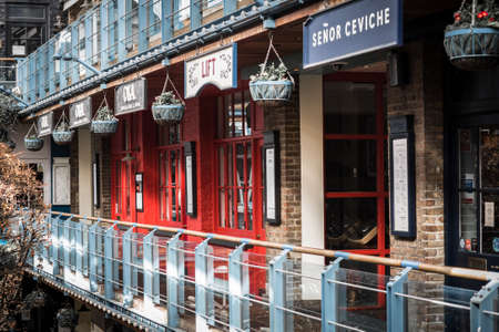 London, UK - 23 February, 2021: Kingly street restaurants and cafe yard is empty  during national lockdown. Covid restrictions, social distancing.のeditorial素材