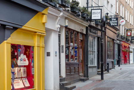 London, UK - 23 February, 2021: Carnaby Street is a pedestrianised shopping street in Soho in the...