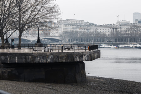 London, UK - February 23, 2021:  London embankment river Thames. Empty streets no people, London...