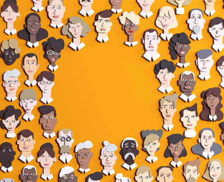 Lots of people's faces made of paper and space for text. Paper cut design 3D renderの写真素材