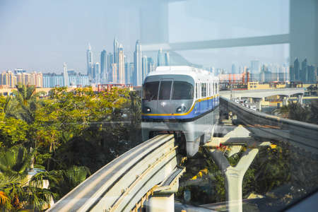 Dubai, UAE United Arabs Emirates - 29 May, 2019: Monorail at Palm Jumeirah with Dubai marina viewのeditorial素材