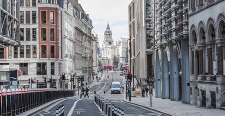London, UK - February 23, 2021: Cannon Street train station and road with St. Pauls view at distance.  Empty streets City of London during national lockdown. Covid restrictions, social distancing.のeditorial素材