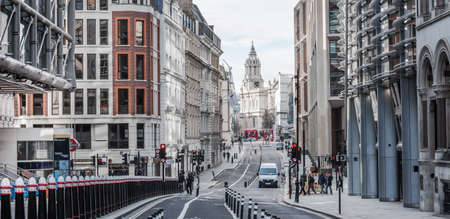 London, UK - February 23, 2021: Cannon Street train station and road with St. Pauls view at distance.  Empty streets City of London during national lockdown. Covid restrictions, social distancing.のeditorial素材