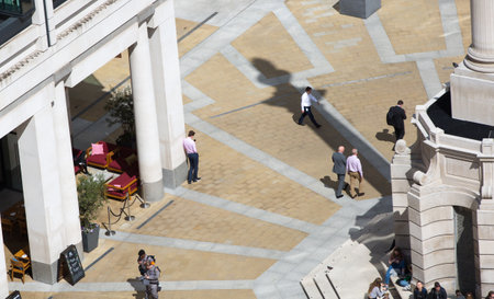 London, UK - 25 April, 2020: St.Pauls square with office workers. City of Londonのeditorial素材