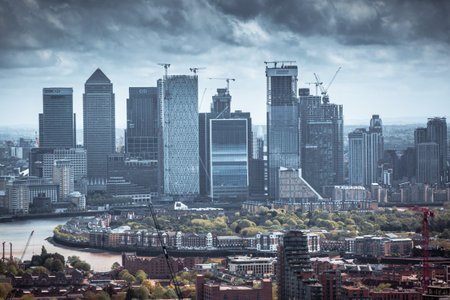 London, UK - 25 April, 2020: Canary Wharf view, business and banking district with modern skyscrapers and corporate buildings.のeditorial素材