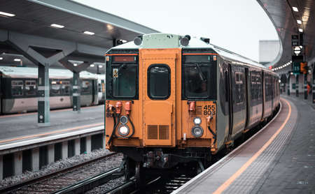 London, UK - 3 February, 2021: Train arriving to London bridge station, no people empty platform. Generally busiest station of the City of London now empty due to Covid lockdownのeditorial素材