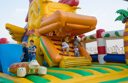 Bulgaria, Sunny beach - July 18, 2019: Play ground for kids, parents waiting while children are playingのeditorial素材