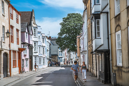 Oxford, UK - June2, 2021: Holywell st and old houses of Oxford university. Uni accommodation