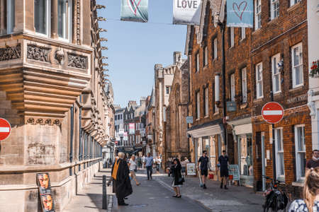 Cambridge, UK - July 16, 2021: St Johns street view with lots of shops and tourists walking through the townのeditorial素材