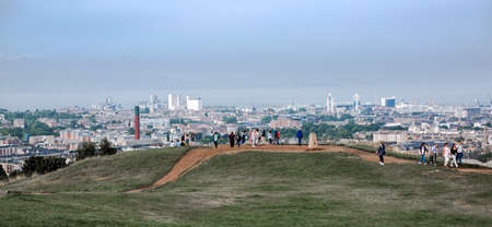 Edinburg, UK - August 23, 2021: People looking over the sea from Calton hillsのeditorial素材
