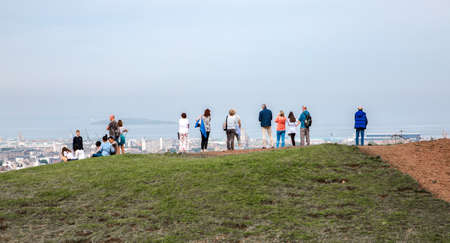 Edinburg, UK - August 23, 2021: People looking over the sea from Calton hillsのeditorial素材