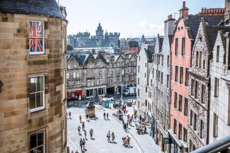 Scotland, Edinburg - August 24, 2021: W Bow slopping road of 19th century with colourful shopfronts and lots of people and tourists walking and admiring the siteのeditorial素材