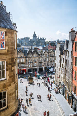 Scotland, Edinburg - August 24, 2021: W Bow slopping road of 19th century with colourful shopfronts and lots of people and tourists walking and admiring the siteのeditorial素材
