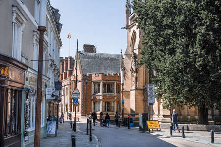 Cambridge, UK - July 16, 2021: St. Mary's street, people and tourists walking by shops and cafesのeditorial素材