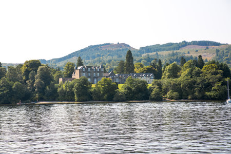 Scotland, Loch Lomond - 25 August, 2021: Cameron House at the Loch Lomond lake one of the beautiful lake of Scotland Highlands. Luxury rooms and suitsのeditorial素材