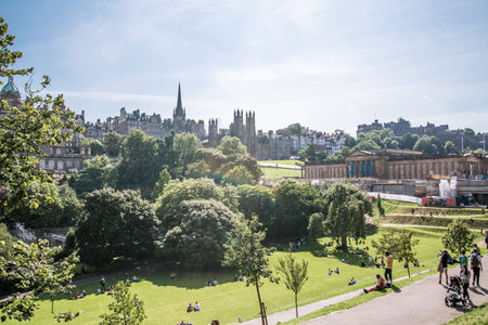 Edinburgh, UK - August 24, 2021: Edinburgh old town view from the City park at sunny dayのeditorial素材